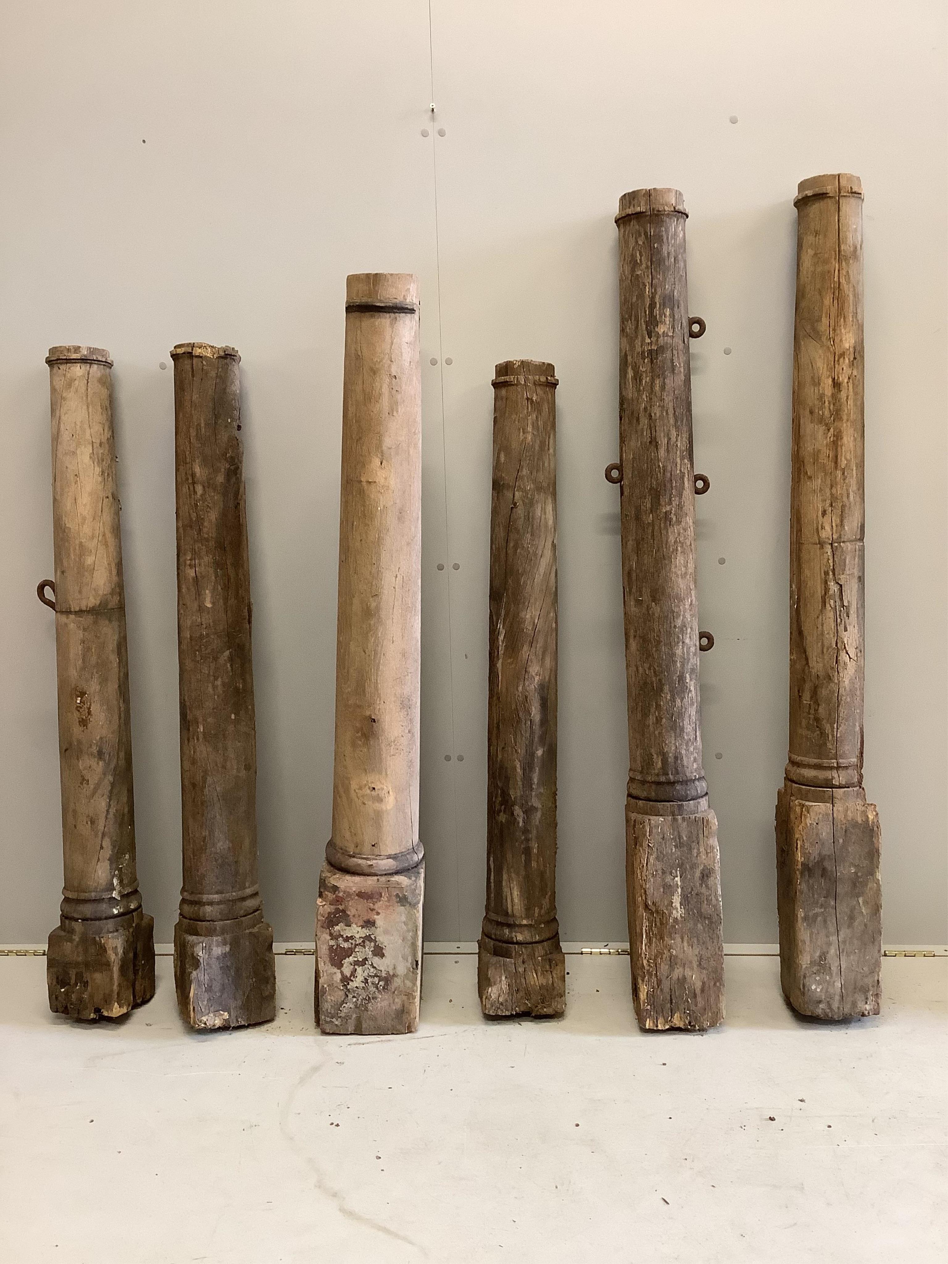 Six assorted hardwood columns, said to have come from a 19th century ship, tallest 164cm. Condition - variable from poor to fair